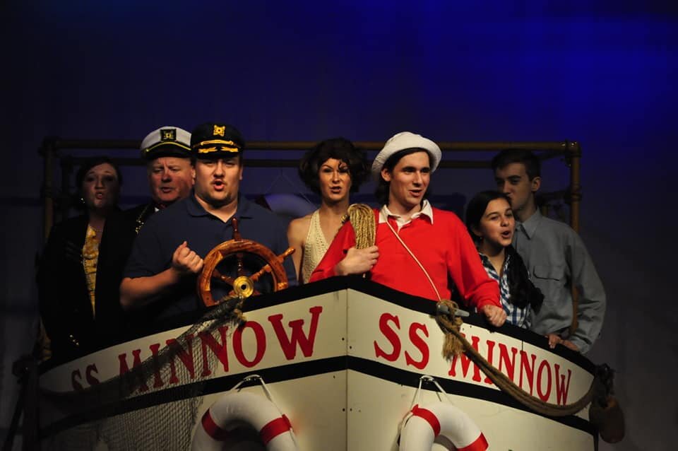 The cast aboard the SS Minnow in an ACT production